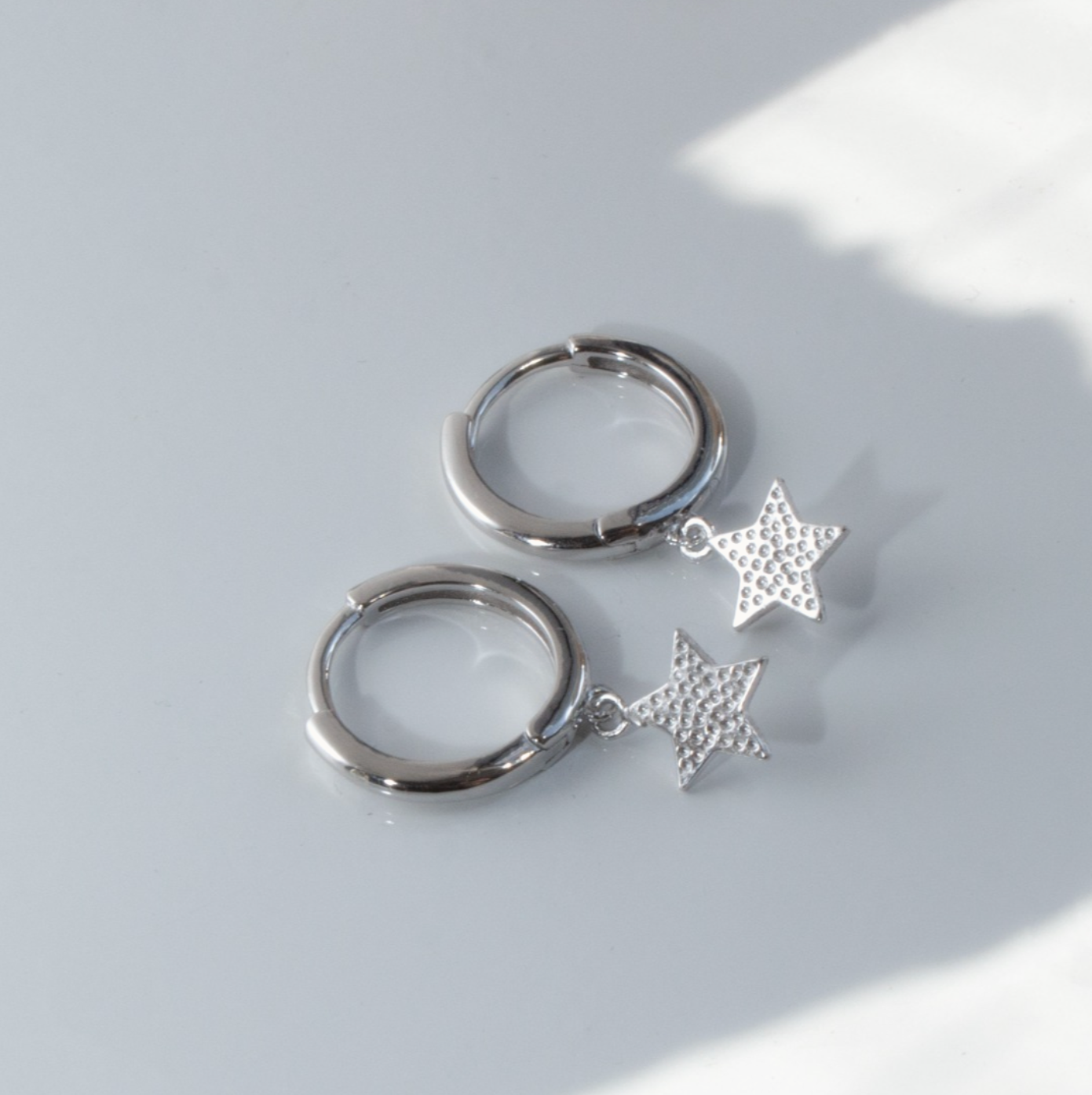 Sterling Silver Star Huggies